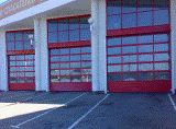 Автоматические секционные промышленные ворота в пожарной части